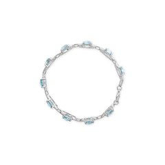 .925 Sterling Silver 7x7 mm Cushion Cut Blue Topaz and 1/20 cttw Round Cut Diamond Fashion Tennis Bracelet (I-J Color, I1-I2 Clarity) - 7"