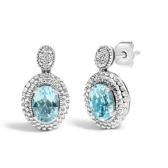 .925 Sterling Silver Diamond Accent and Oval Blue Topaz with Beaded Halo Drop Stud Earrings (I-J color, I1-I2 Clarity)