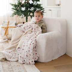 Modern Oversized Cozy Accent Lounge Chai with a child snuggled in a blanket, perfect for relaxation and comfort.