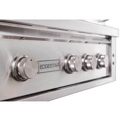 30-Inch 60K BTU Freestanding Gas Grill with Rotisserie control knobs illuminated with blue LED lights.