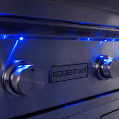 30-Inch 60K BTU Freestanding Gas Grill with Rotisserie control knobs illuminated with blue LED lights.