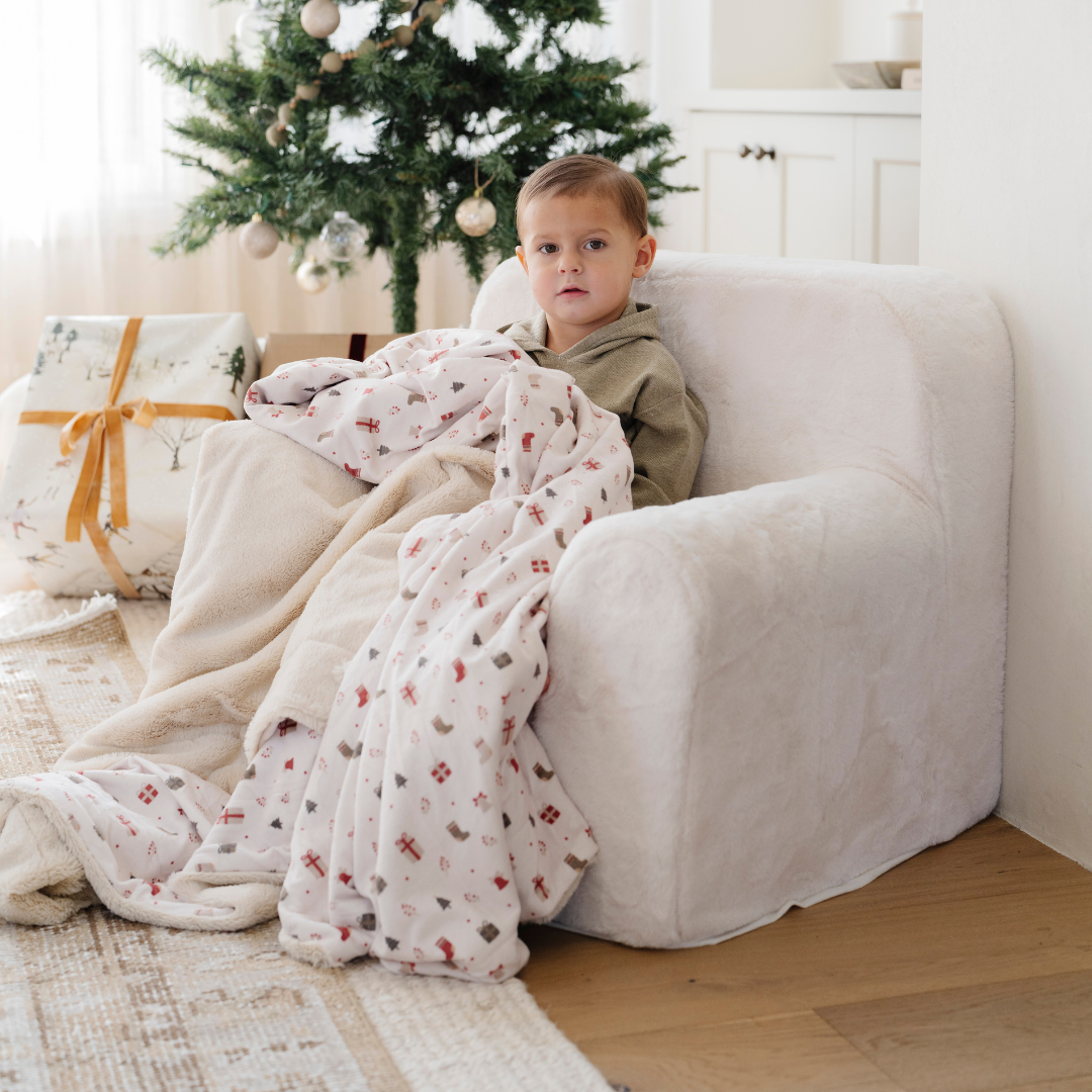 Modern Oversized Cozy Accent Lounge Chai with a child snuggled in a blanket, perfect for relaxation and comfort.